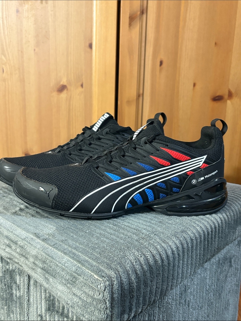 Puma Black Sneakers with Blue & Red Accents